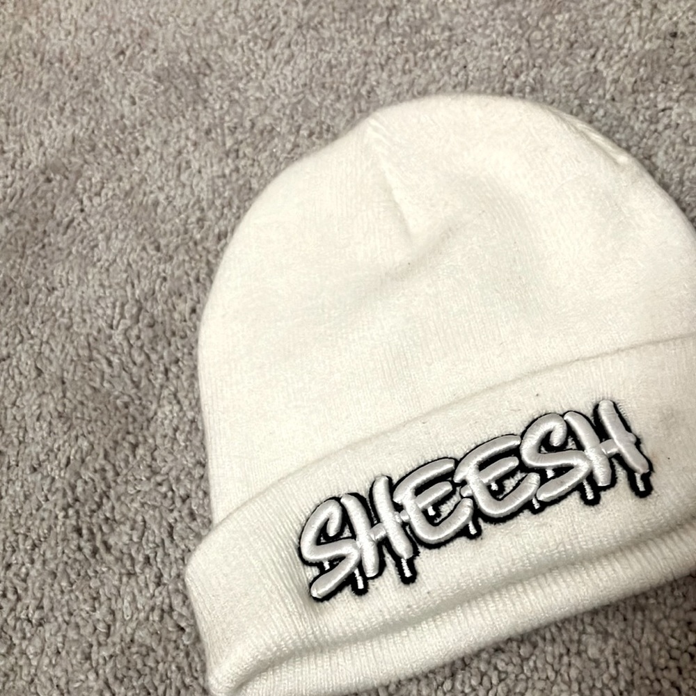 White over hat,”Sheesh” title
